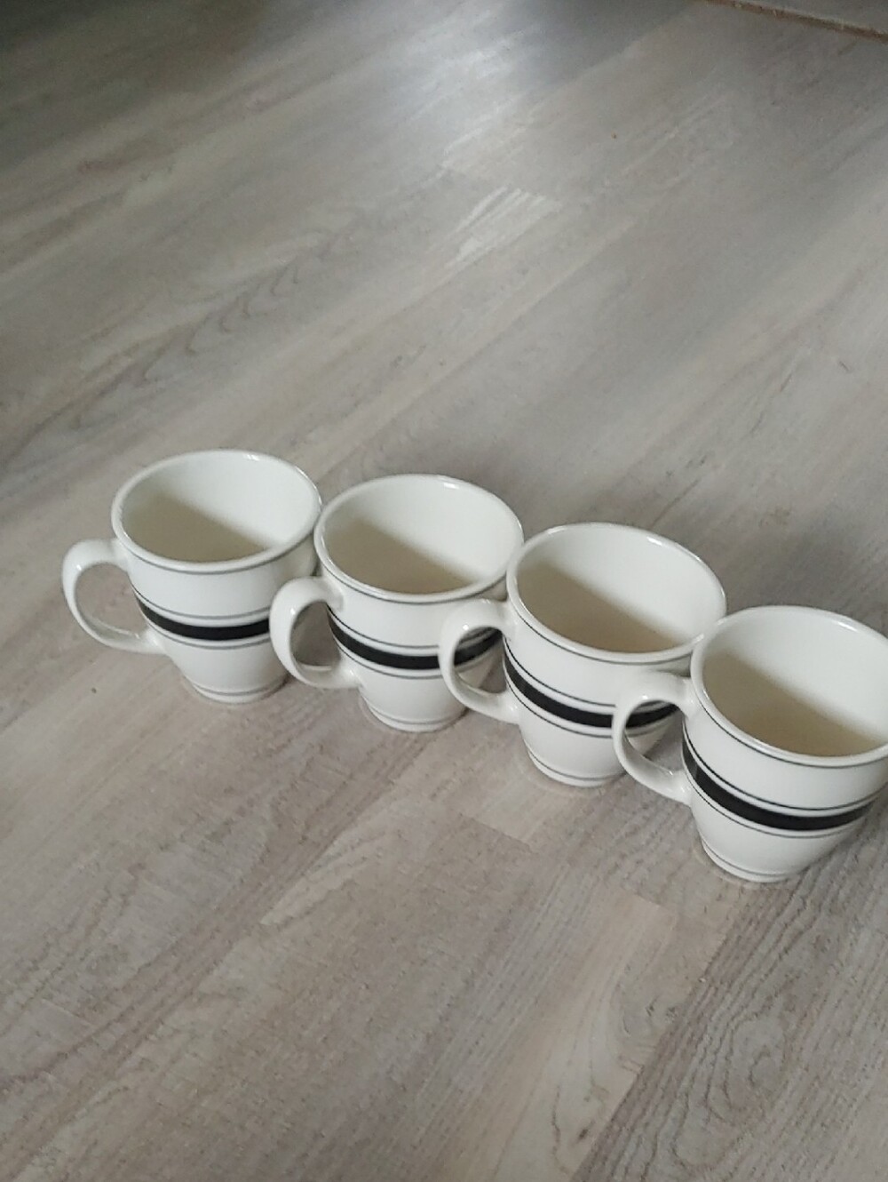 Set of 4 White Ceramic Mugs with Black Stripe